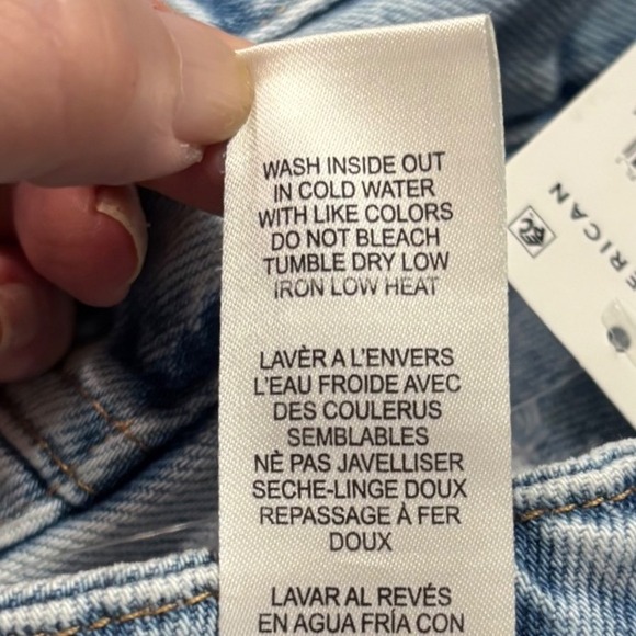 Good American Good Boy Flare‎ Jeans Distressed Hem Slit Light Wash Size 0 NWT - Picture 6 of 14